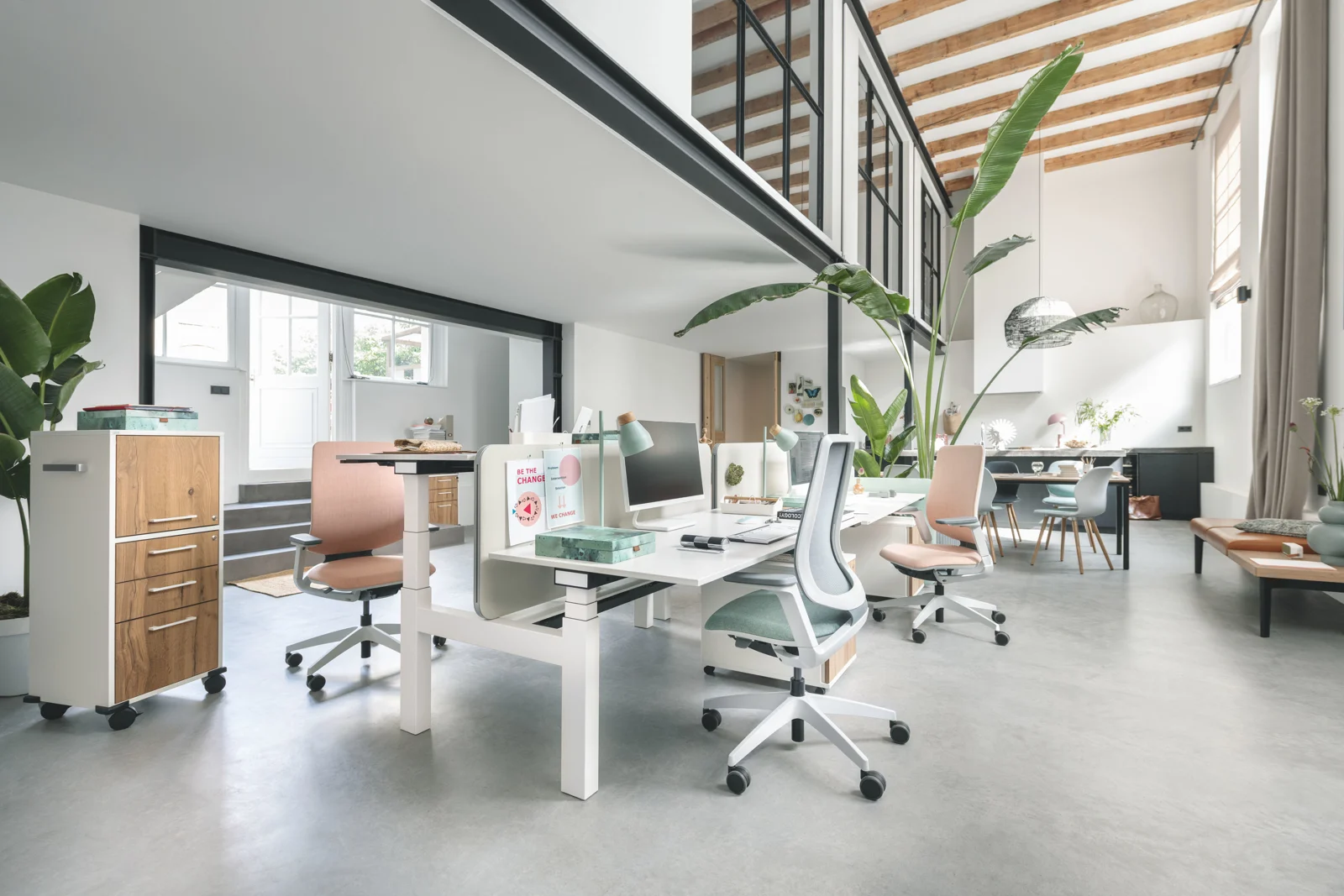 Sedus desks and task chairs in a bright workplace setting