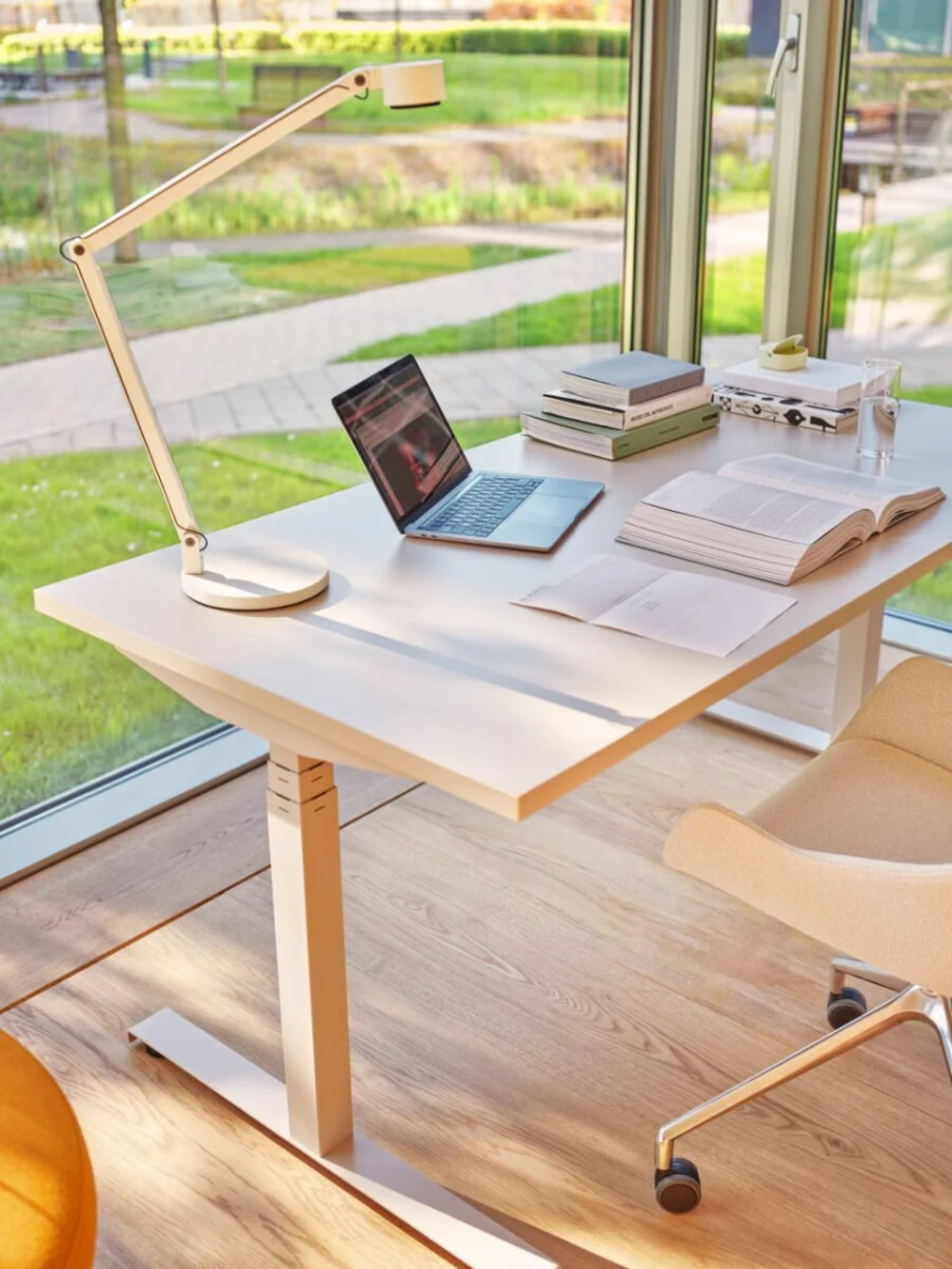 MDD Ogi Drive desks in a bright workplace setting